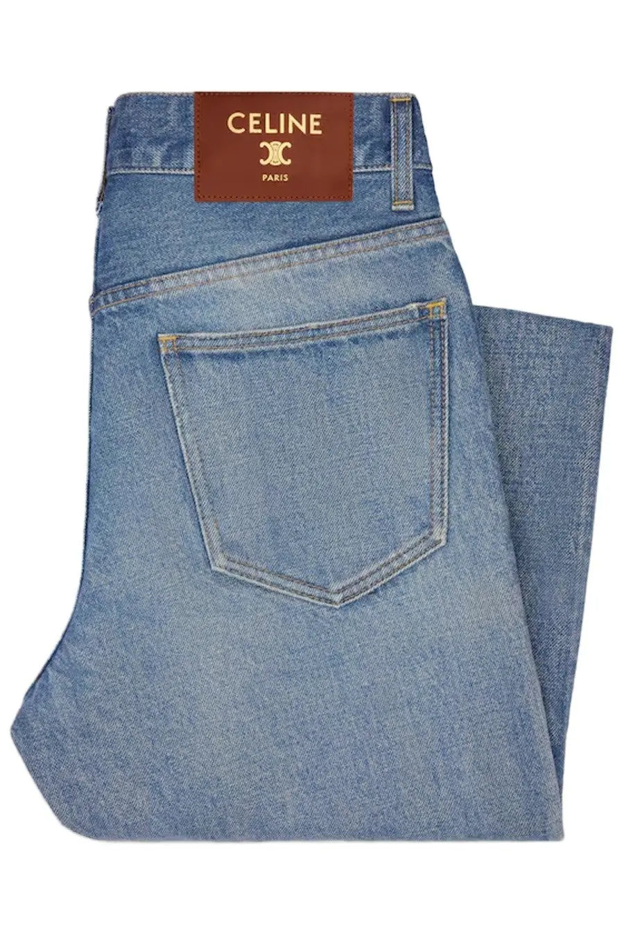 Celine women’s light-wash blue denim jeans with a brown leather Celine Paris brand label on the waistband back side