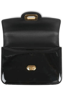 Black patent leather Celine women’s Josephine bag with gold-tone hardware and minimalist design front view