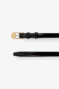 Celine women’s black patent leather belt with gold-tone buckle showcasing elegant wearable luxury accessory