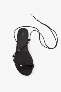 Black celine women’s leather sandals with slender straps and silver toned hardware