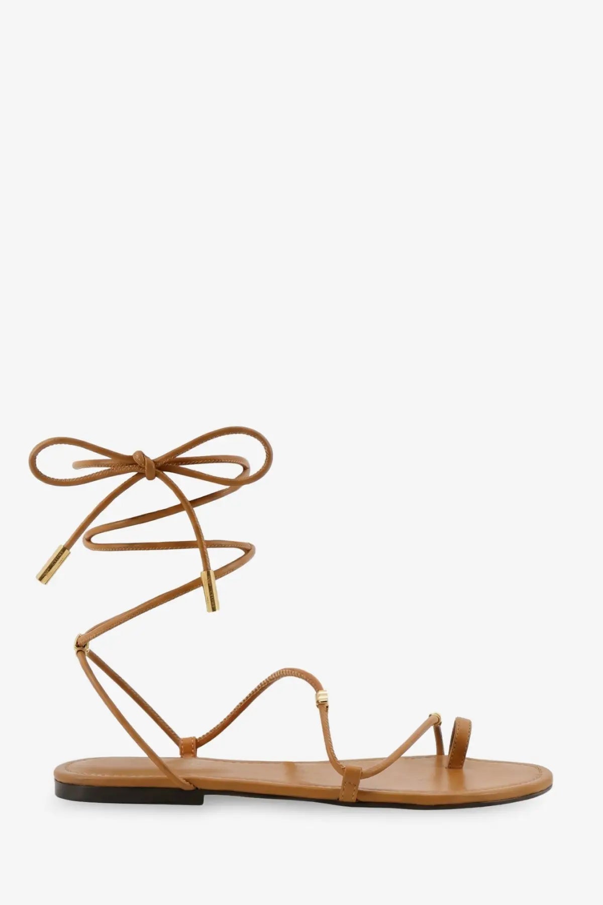 Celine women’s leather sandals Sahara in tan with lace-up design gold-tone metal accents and flat sole