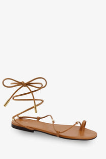 Celine womens leather sandals Sahara tan strappy sandal with gold tone metal accents and tied ankle strap
