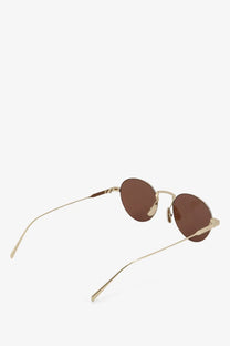 Celine women’s metal sunglasses in gold tone with brown round lenses and minimalist thin metal frame