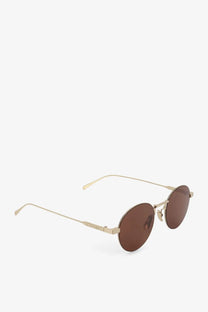 Celine women’s metal sunglasses with gold-toned round frame and brown lenses for stylish sun protection