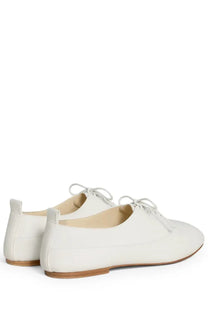 Celine women’s moccasin lise white white leather lace-up flats with minimalist design and light-colored laces