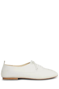 Celine women’s moccasin lise white leather oxford shoe with flat sole and subtle stitching details