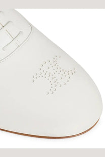Celine womens moccasin lise white white leather oxford shoe with subtle perforated star detail on the toe
