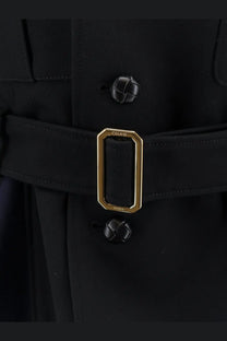 Black celine paris belt buckle with gold-tone rectangular frame and braided leather buttons on black peplum wool jacket