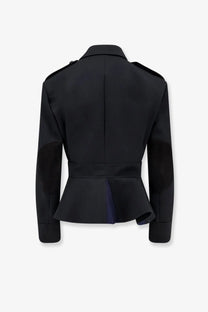 Celine women’s black peplum wool jacket with structured shoulders and a cinched waist for a tailored fit