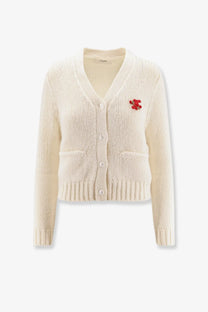 Celine women’s cream silk and cashmere knitted cardigan with a red embroidered bear brooch on the left chest