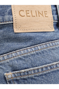 Beige leather celine patch stitched on medium-wash blue denim in celine women’s stone washed cotton jeans red back view