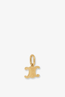 Gold-colored celine women’s celine triomphe brass charm with polished metallic finish and interlocking cc design