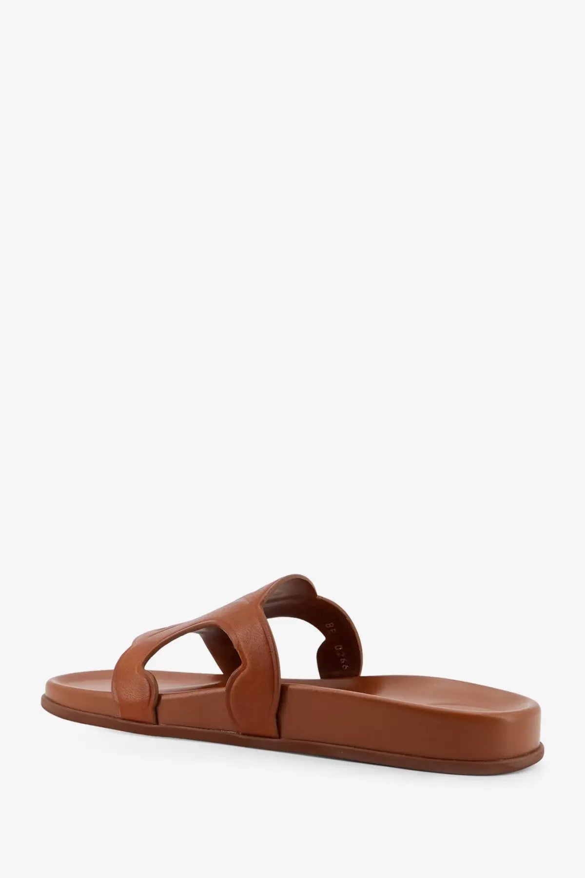 Celine women’s beige leather slide sandal with minimalist design and two straps for casual wear