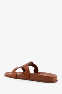Celine women’s beige leather slide sandal with minimalist design and two straps for casual wear