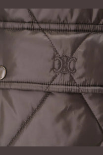 Celine women’s green quilted jacket with subtle embroidered logo at the center front in lightweight fabric