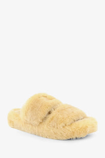 Celine women’s triomphe slide shearling sandals in cream-colored plush sheepskin with two wide soft straps