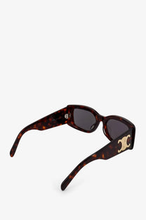 Celine women’s tortoiseshell acetate sunglasses with brown lenses and gold-tone c-logo detailing on the temples