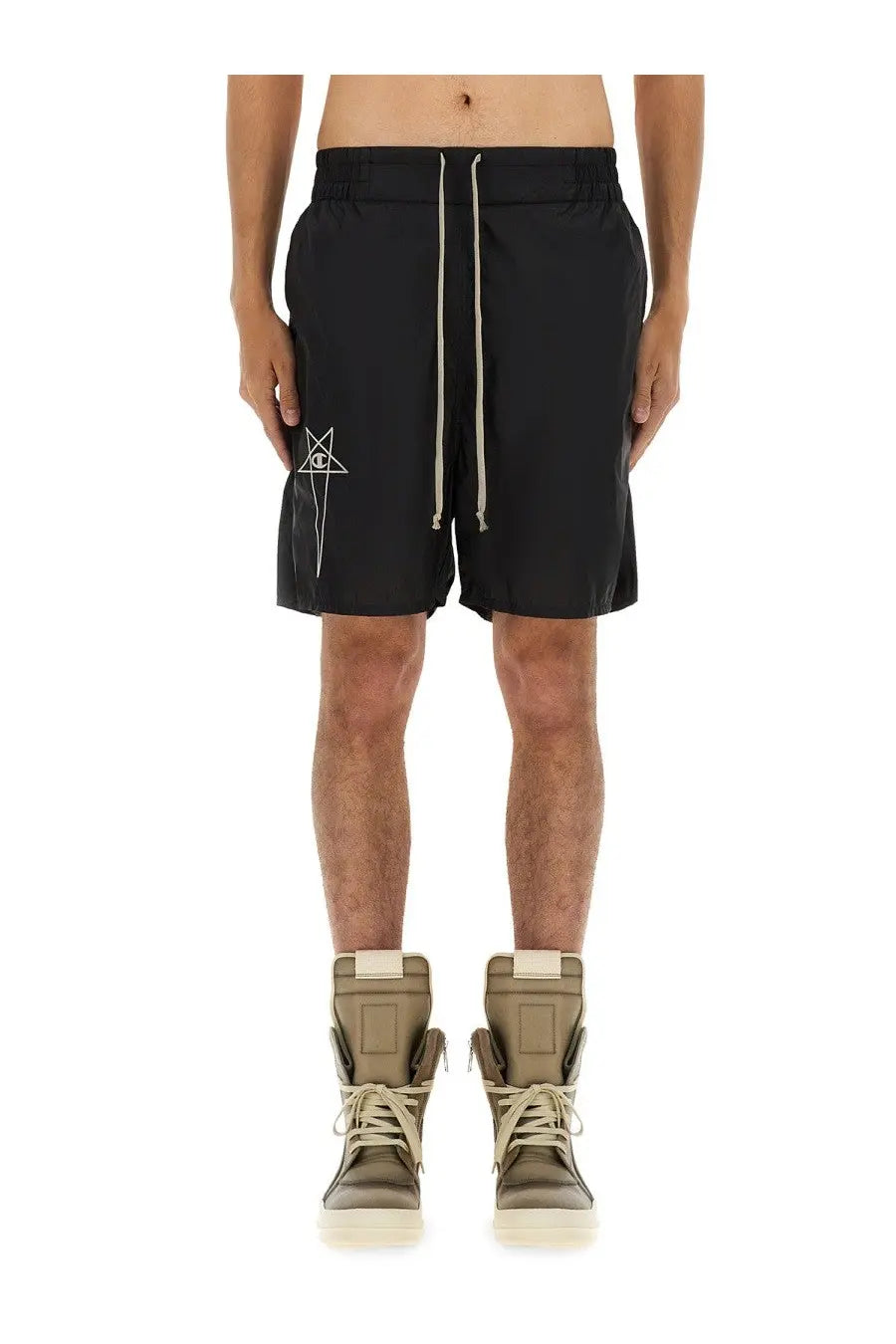Black nylon Champion x Rick Owens men’s athletic shorts with white embroidered logo and matching drawstrings on left thigh