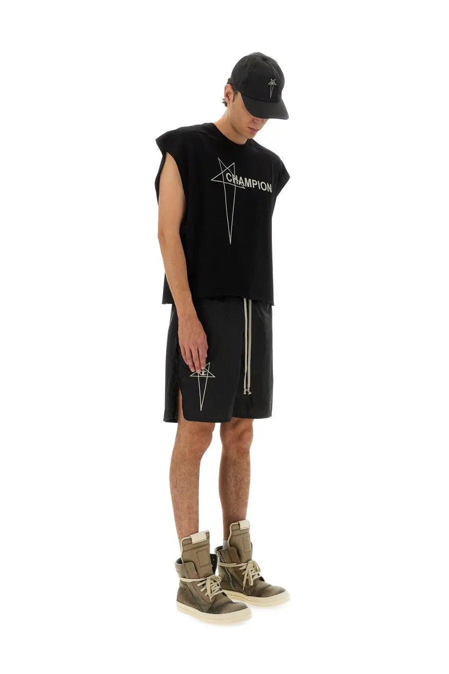 Black sleeveless champion t-shirt with white star and text graphic paired with champion x rick owens nylon shorts black