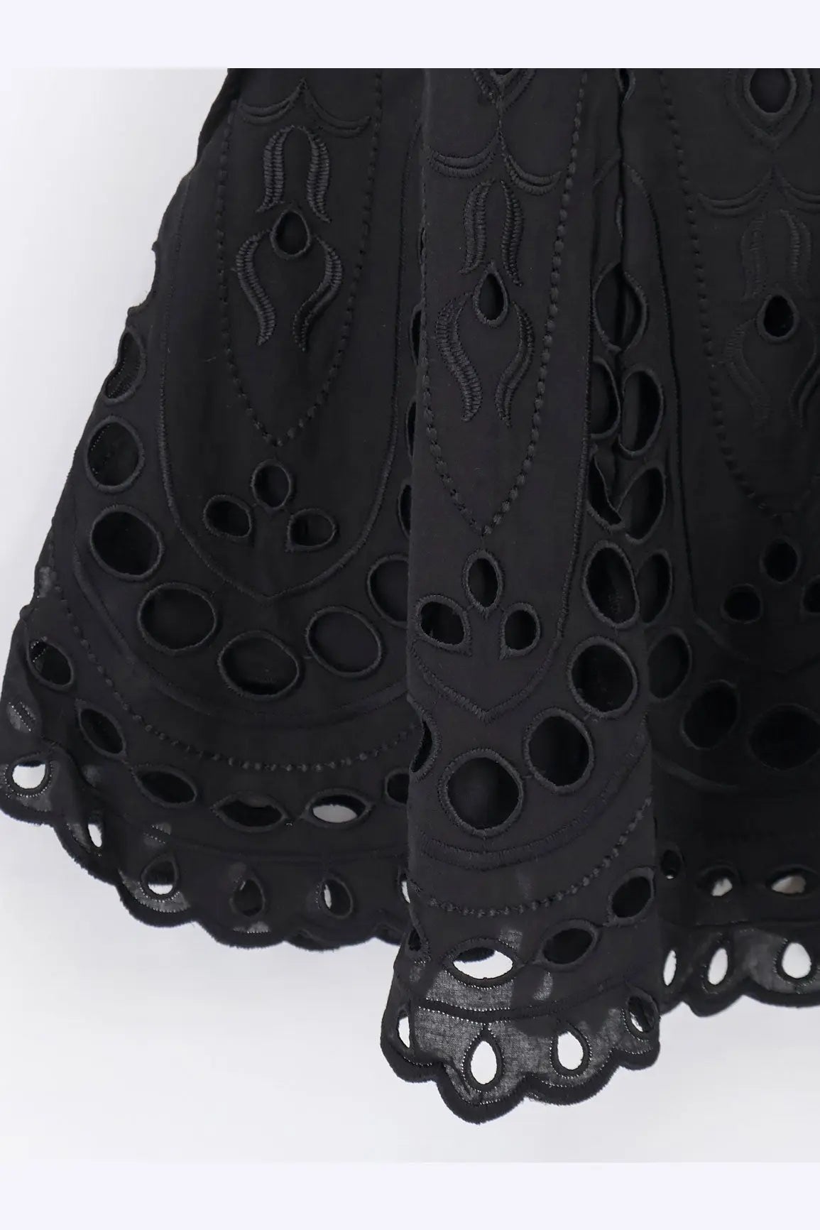 Charo ruiz ibiza women’s bail short dress black featuring a black embroidered lace skirt with cut-out patterns and scalloped hem