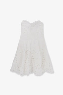 A delicate white eyelet dress with fitted bodice and flared skirt from charo ruiz ibiza women’s bail short dress collection