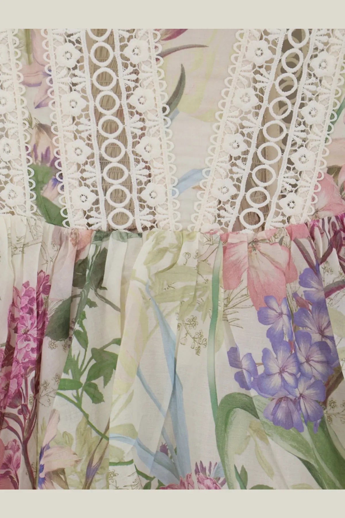 Charo Ruiz Ibiza women’s gardenia mini dress white with delicate white lace trim and colorful botanical print neckline