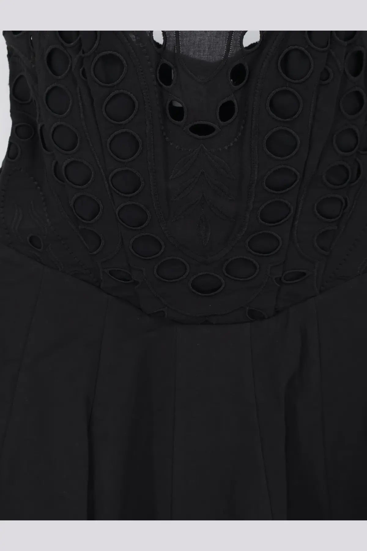 Black charo ruiz ibiza marlin long dress with circular cutout embroidery on the bodice in lightweight fabric