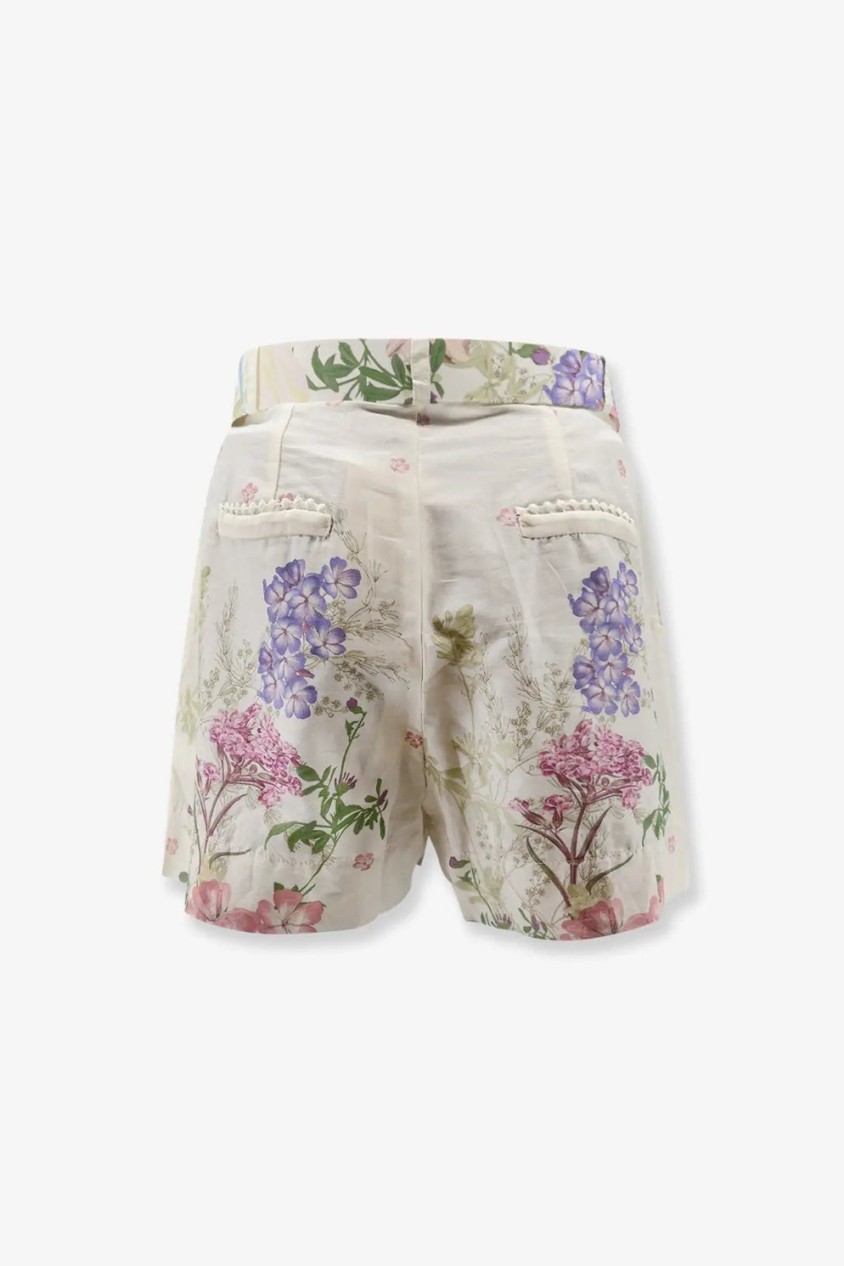 Beige floral cotton blend shorts with purple and pink blossoms green leaves and pearl trimmed pockets by charo ruiz ibiza