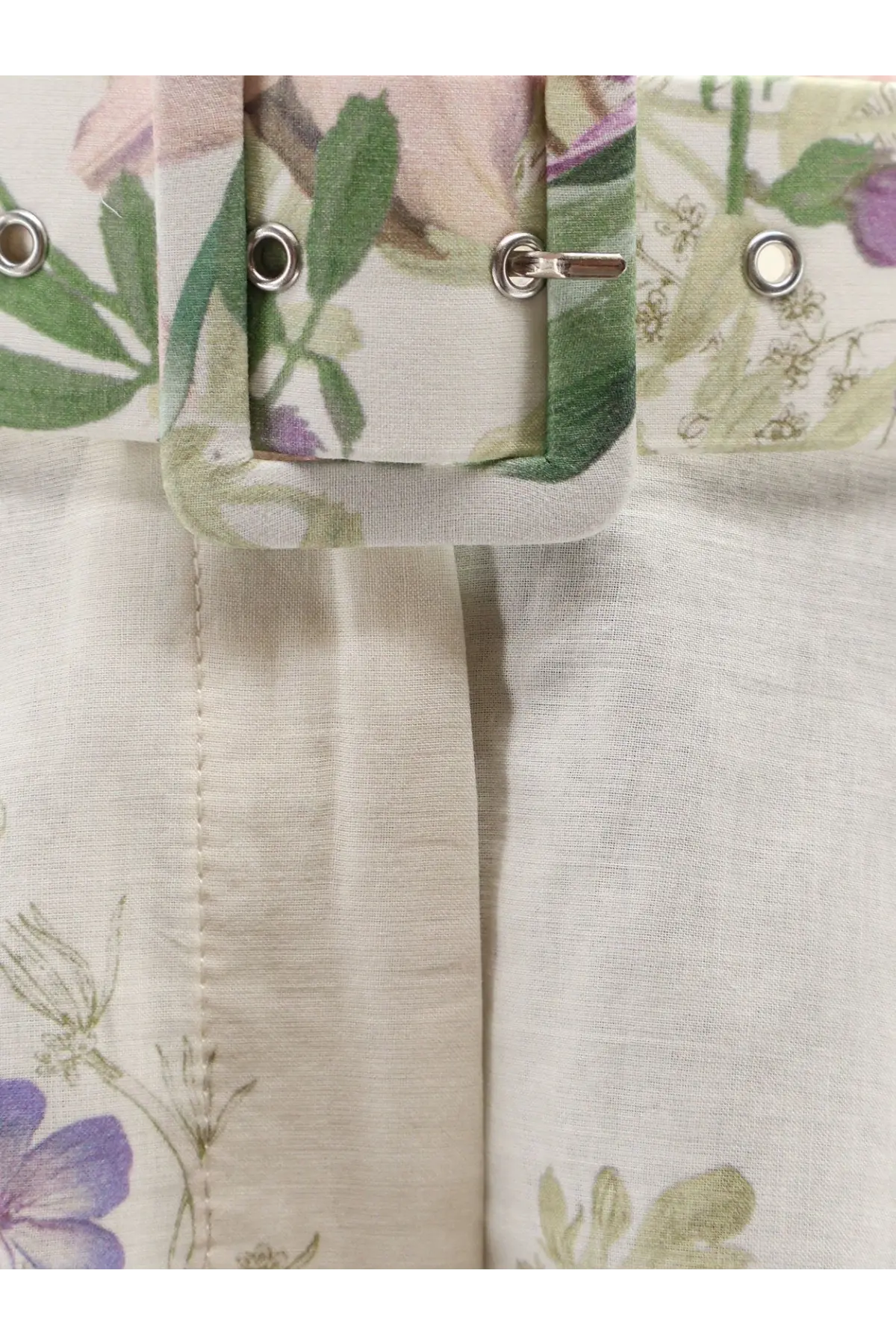 Charo Ruiz Ibiza women’s white pansy cotton blend shorts with a floral pastel belt featuring green leaves and purple flowers