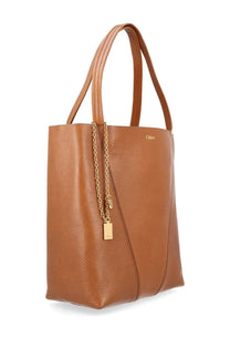 Tan leather tote bag with gold-tone chain and plaque charm by Chloé in medium brown for women