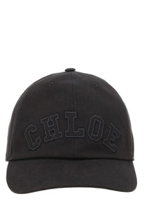 Chloé women’s black baseball cap with embroidered logo, structured six-panel design, and matching fabric brim