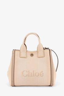 Beige textured leather chloé tote bag with top handles and detachable shoulder strap for versatile carrying