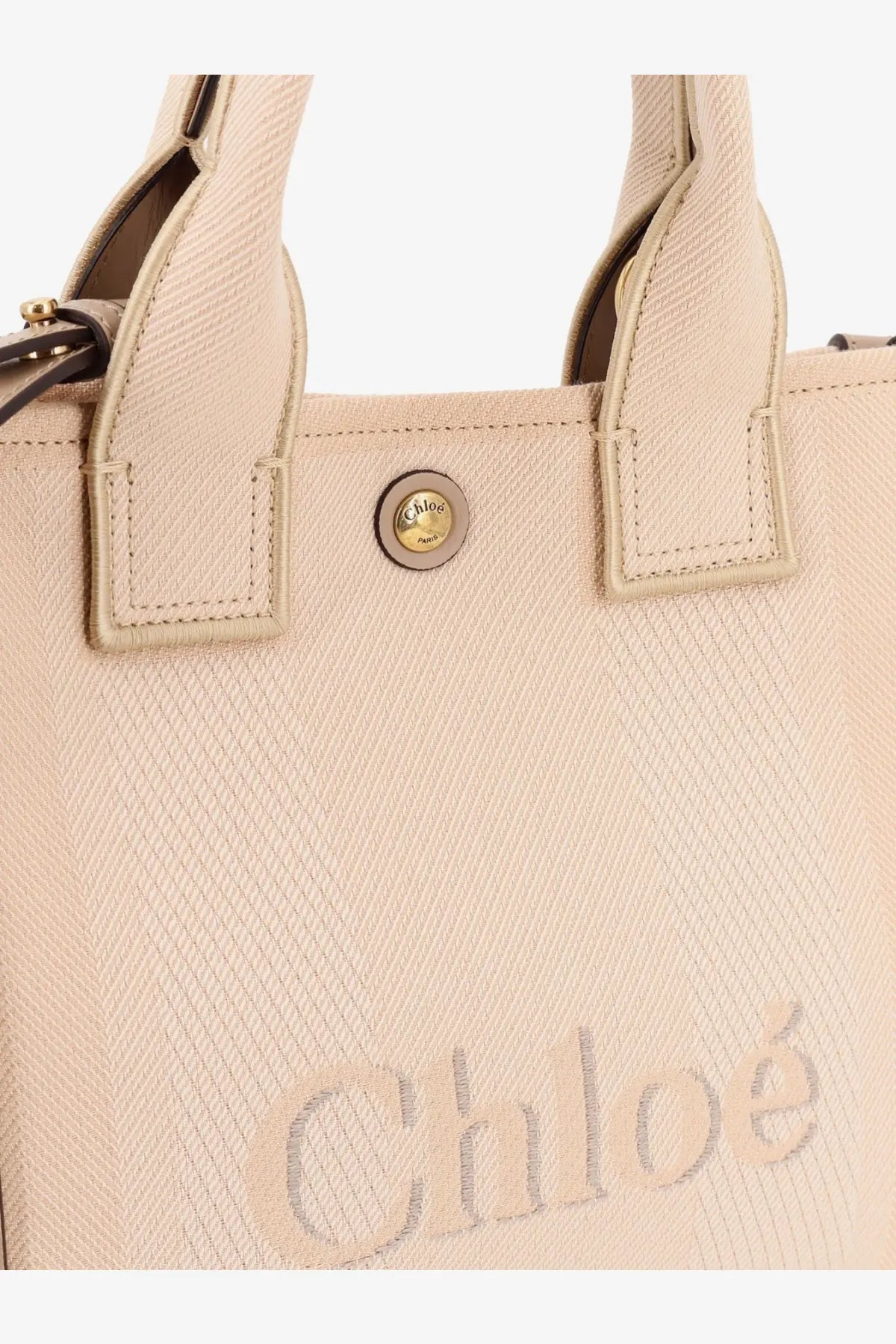Beige woven canvas tote bag with gold-tone logo button and embossed chloé brand name for women crossbody use