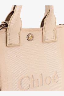 Beige woven canvas tote bag with gold-tone logo button and embossed chloé brand name for women crossbody use