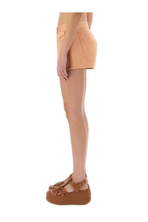 Chloé women’s cotton shorts in blue denim with a classic five-pocket design and slightly tapered leg visible from the front