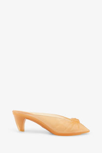 Chloé women’s transparent orange jelly mule sandals with molded heel and decorative bow at the toe in tpu material