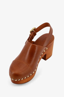 Chloé women’s brown leather clog sandal with wooden block heel and gold-tone studs on the toe and side