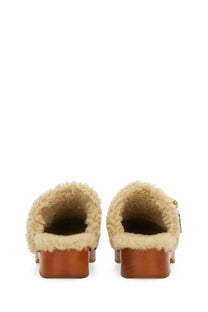 Chloé women’s cream shearling-lined mule sandals with wooden block heel and gold-tone hardware