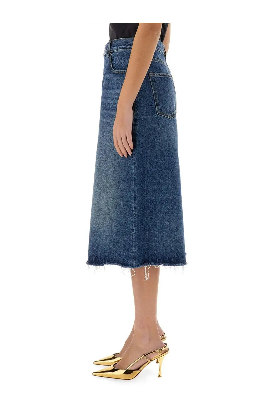 The back of chloé women’s patchwork denim bermuda shorts in medium blue with two back pockets and a frayed hem