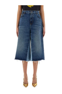 Blue denim wide-leg culottes with frayed hem from chloé women’s patchwork denim bermuda shorts collection