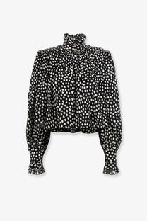 Chloé women’s black silk blouse with white polka dots featuring ruffled high neckline and puffed sleeves