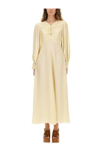 A flowing pale yellow satin midi dress with long puffed sleeves and ruched neckline by Chloé women
