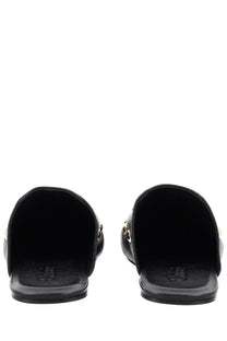 Chloé women’s sabot Rita black leather slip-on sandals with gold-tone metal accents and embossed logo insole