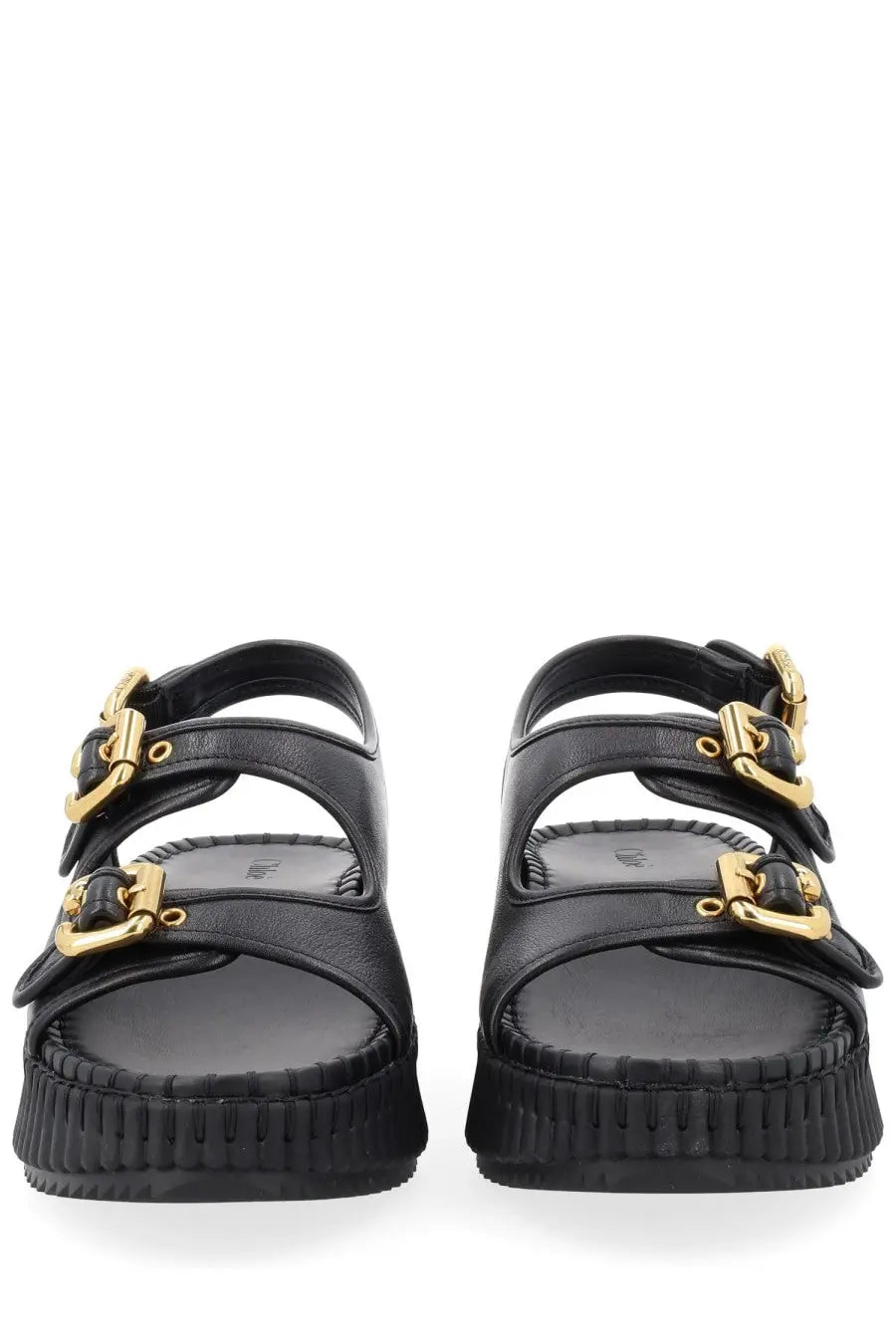 Chloé women’s sandal nama black with black leather, gold-tone buckle straps, and chunky platform sole front view