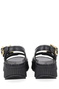 Chloé women’s sandal Nama black platform sandals with gold-tone buckle details and ribbed soles