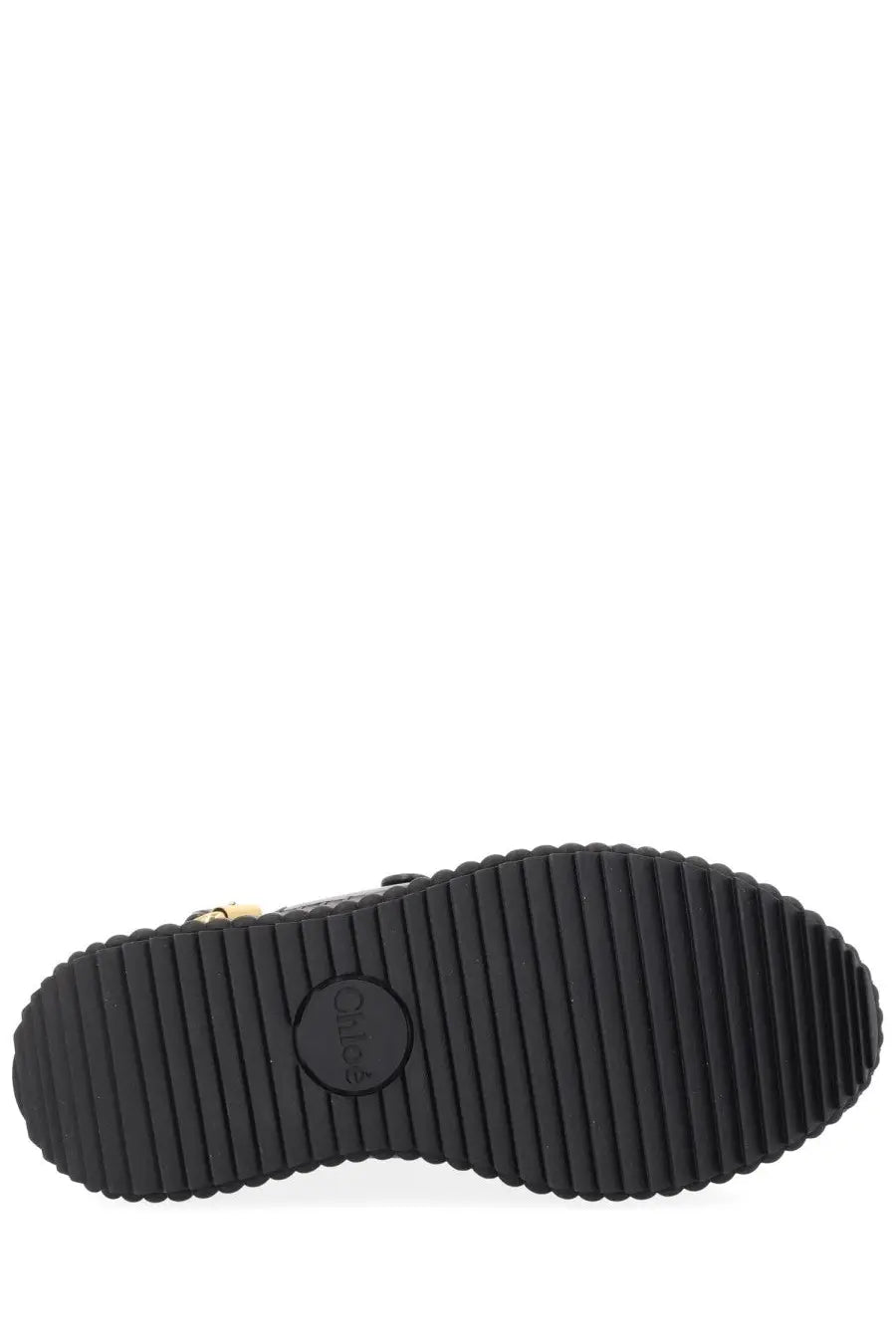 Black rubber sole with textured ribbed pattern and cleo logo embossed on chloe womens sandal nama black