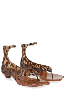 Chloé women’s brown leopard-print jelly sandals with low heel and ankle strap for stylish summer wear