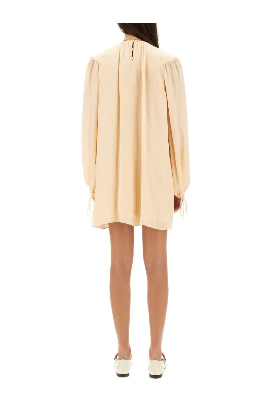 Beige silk long-sleeved mini dress by Chloé with puffed sleeves and side ties for elegant occasions