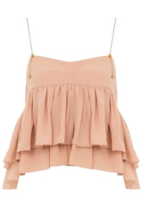 Chloé women’s blush pink silk crop top with tiered ruffles and thin gold chain straps with gold bead accents