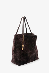 Dark brown velvet tote bag with black leather handles and gold chain charm by chloé womens spin shearling shoulder bag brown